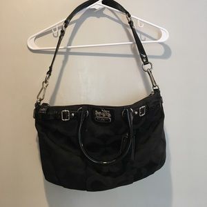Coach black bag with red interior